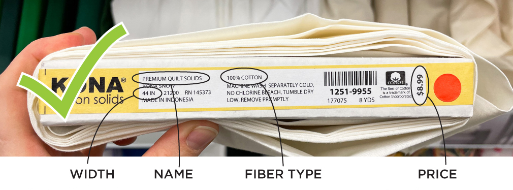 Image shows the label of a bolt of fabric. The width, name, fiber type, and price are all circled and called out .